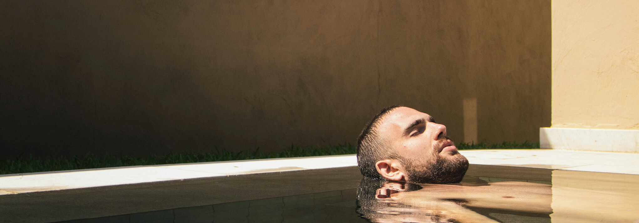 Man relaxing in pool