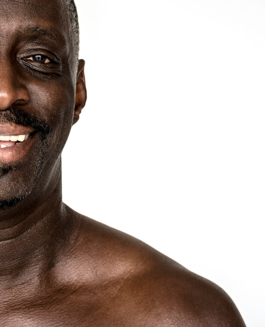 A portrait shot of a man smiling