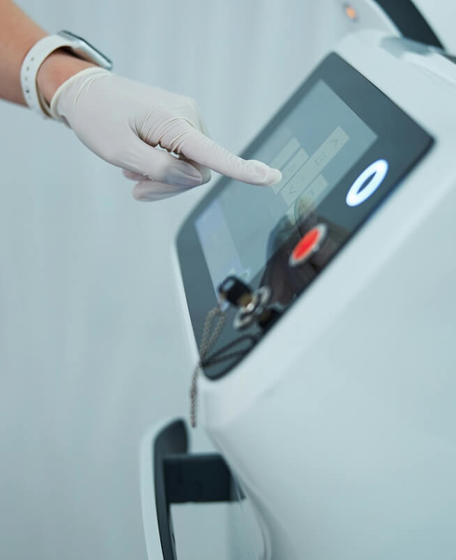 A technician operating a machine