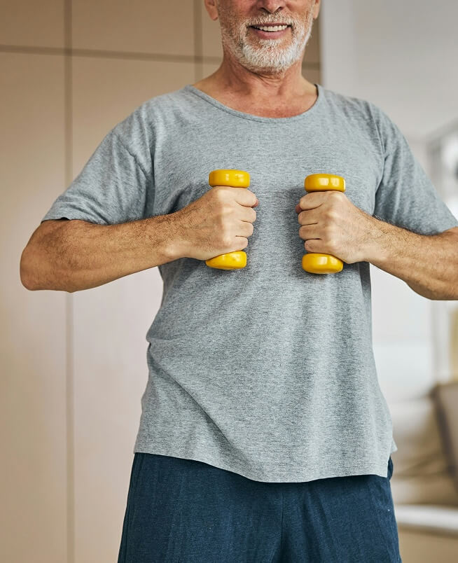 Man holding two weights