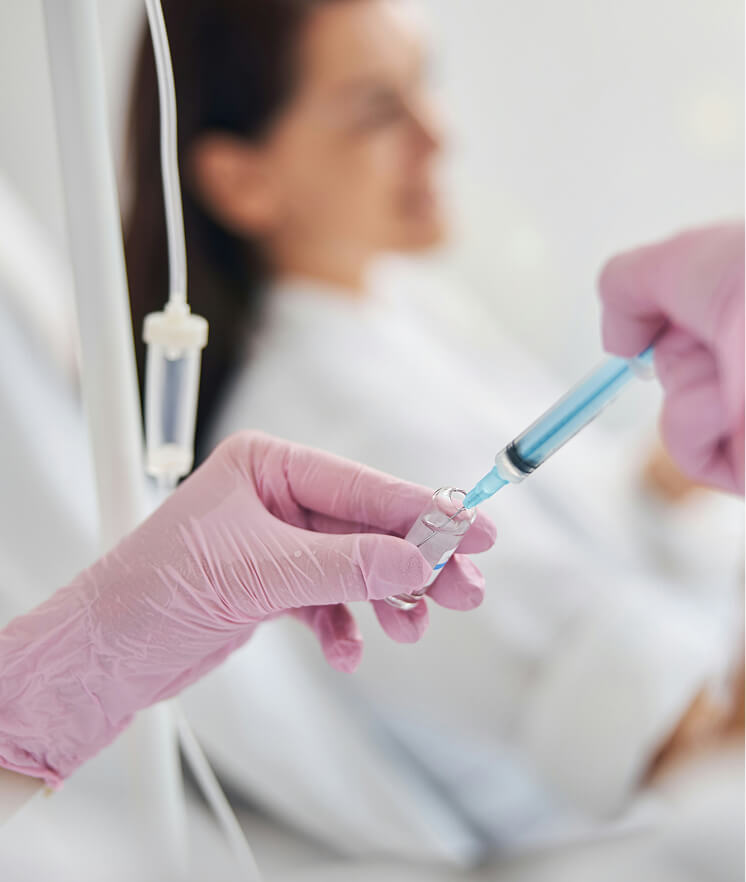 Medical professional performing IV therapy