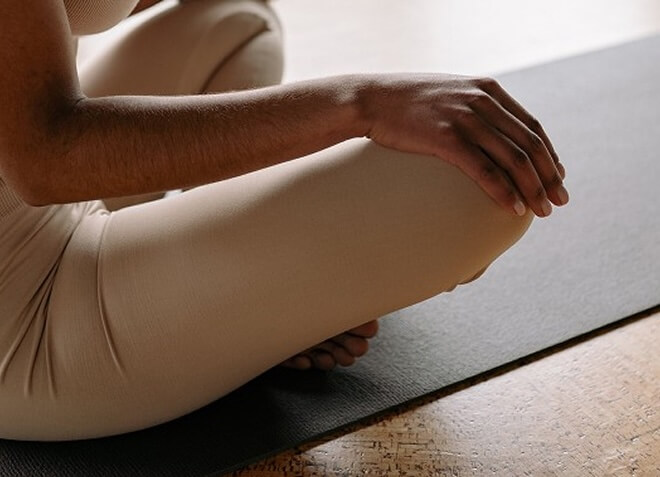 A close-up of a woman doing yoga