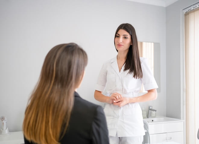 Women meeting with medical professional