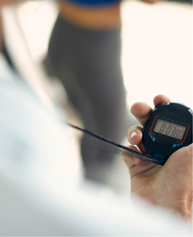 Person holding a timer